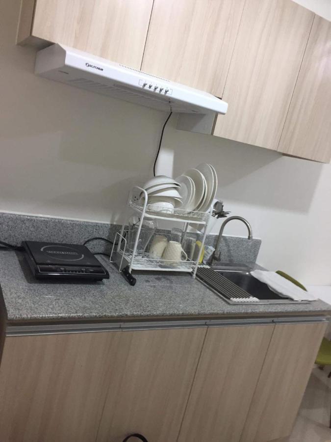 Inspiria Aparthotel Davao Bagian luar foto