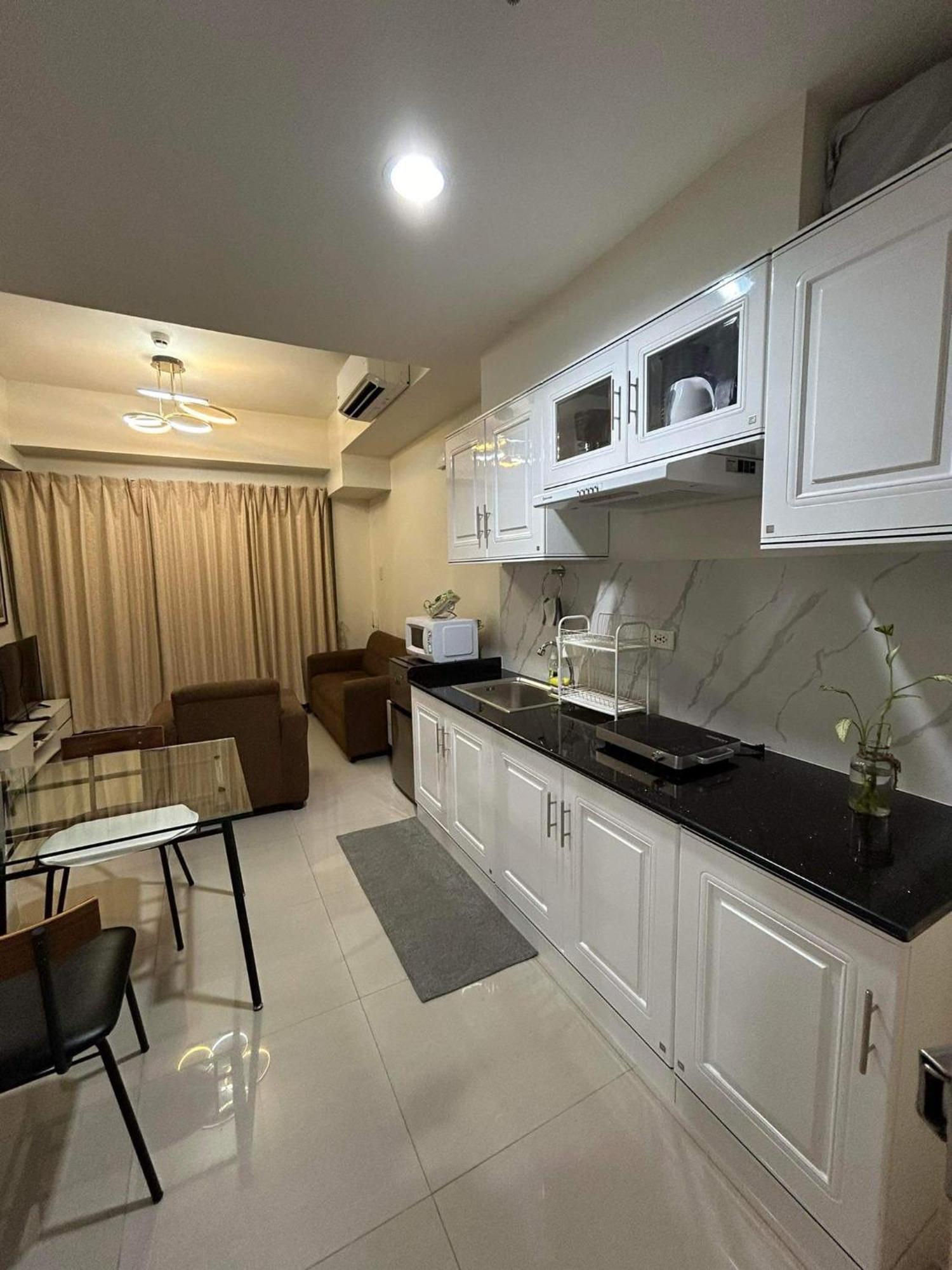 Inspiria Aparthotel Davao Bagian luar foto
