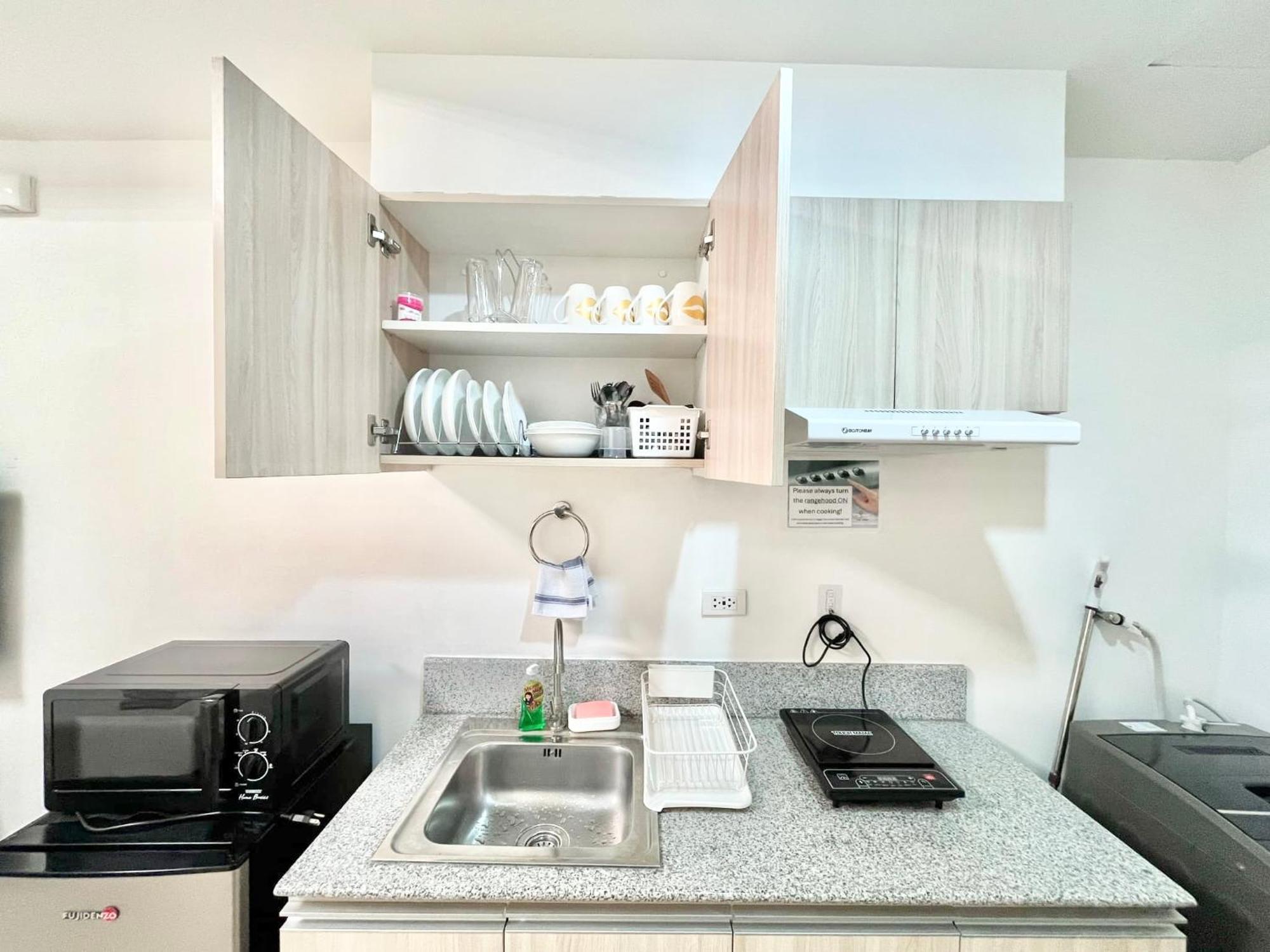 Inspiria Aparthotel Davao Bagian luar foto
